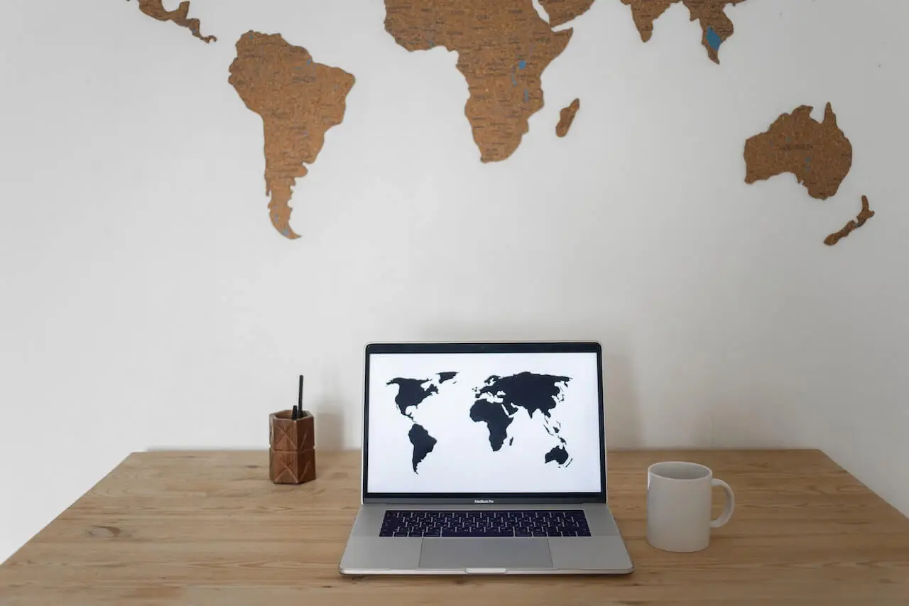 Laptop displaying global digital content localisation map