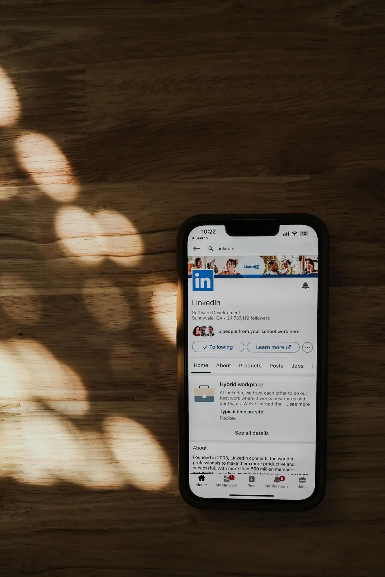 LinkedIn business profile on the screen viewing on the mobile app 