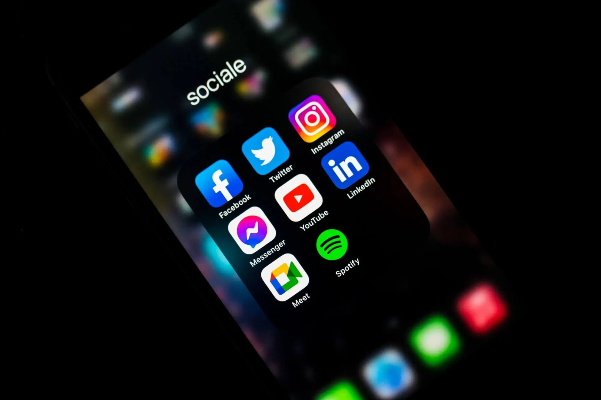 iPhone highlighting various social media apps and platform.